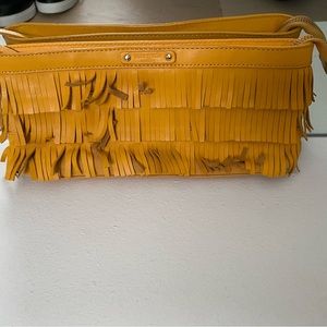 Kate spade leather fringe clutch